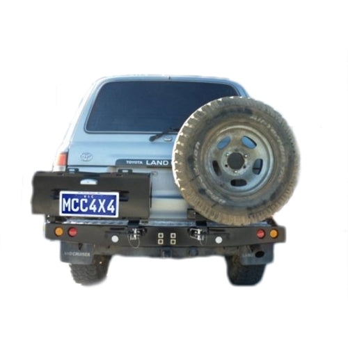 MCC-4x4-Rear-Carrier-Bar-022-02-Jerry-Can-Holder-Spare-Wheel-Carrier-Toyota-Landcruiser-80-Series-Rear-View-1.jpg